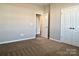 Bright bedroom with double door closet and carpet flooring at 13326 Blanton Dr, Huntersville, NC 28078