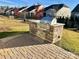 Built-in outdoor kitchen with grill and stone countertops at 13326 Blanton Dr, Huntersville, NC 28078