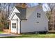 Side view of charming house with gray siding and a deck at 1436 Panther Rd, Lancaster, SC 29720