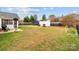 Large backyard with shed, trampoline, and basketball hoop at 3419 Brickyard Ln, Midland, NC 28107