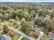 Aerial view showcasing the home's location within a quiet, tree-lined neighborhood at 520 Briar Creek Rd, Gastonia, NC 28056