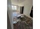 Unfinished bedroom with damaged walls and floor at 211 Cedar Nw Dr, Concord, NC 28025