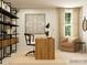 Home office with a wooden desk and chair at 4476 Potter Wheel Dr, Fort Mill, SC 29715