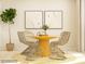Dining room with round wooden table and woven chairs at 4476 Potter Wheel Dr, Fort Mill, SC 29715