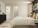 Spacious bedroom with two twin beds, dresser, and ensuite bathroom at 4476 Potter Wheel Dr, Fort Mill, SC 29715