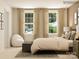 Bedroom with a bed, window, and seating at 4476 Potter Wheel Dr, Fort Mill, SC 29715