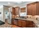 Spacious kitchen with stainless steel appliances and granite countertops at 10008 Cuyo Ct, Tega Cay, SC 29708