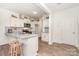 Modern kitchen with white cabinets, granite counters, and stainless steel appliances at 14034 Clayborn St # 28, Midland, NC 28107