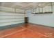 Spacious garage with overhead storage and epoxy floor at 14034 Clayborn St # 28, Midland, NC 28107