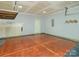 Garage with epoxy flooring and overhead storage at 14034 Clayborn St # 28, Midland, NC 28107