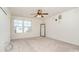 Spacious bedroom with ceiling fan and neutral carpeting at 14034 Clayborn St # 28, Midland, NC 28107