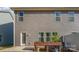 Rear view of house showing patio and garden at 14034 Clayborn St # 28, Midland, NC 28107