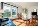 Living room with hardwood floors, leather couches, and a coffee table at 834 Brookwood Dr, Mooresville, NC 28115
