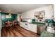 White kitchen with stainless steel appliances and green countertops at 834 Brookwood Dr, Mooresville, NC 28115