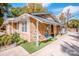 Brick ranch house with covered side porch, and a large backyard at 834 Brookwood Dr, Mooresville, NC 28115