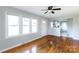 Open living room with hardwood floors and view into the kitchen at 503 Cherry St, Belmont, NC 28012