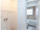 Laundry room with washer/dryer hookups and storage at 503 Cherry St, Belmont, NC 28012