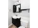Bathroom with vanity, toilet, and updated fixtures at 503 Cherry St, Belmont, NC 28012