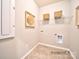 Laundry room with shelving and tile floor at 4540 Potters Wheel Dr, Fort Mill, SC 29715