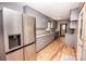 Galley kitchen with stainless steel appliances, granite countertops, and ample cabinetry at 539 Bethlehem Rd, Statesville, NC 28677