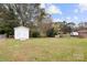 Spacious backyard with a shed and grassy area at 2916 Lake Dr, Shelby, NC 28152