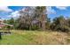 Large backyard with grassy area and mature trees at 3925 Phelps Rd, Vale, NC 28168