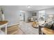 Spacious living room with light grey walls and wood floors at 3925 Phelps Rd, Vale, NC 28168