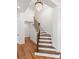 Stunning wooden staircase and a crystal chandelier at 108 Augusta Ln, Shelby, NC 28150