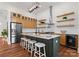 Modern kitchen with light wood cabinets, a large island, and stainless steel appliances at 108 Augusta Ln, Shelby, NC 28150