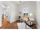 Bright home office with a desk, window seat, and hardwood floors at 108 Augusta Ln, Shelby, NC 28150