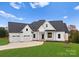 Charming farmhouse style home with a three-car garage at 108 Augusta Ln, Shelby, NC 28150
