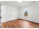 Simple bedroom with hardwood floors and a window offering a view at 108 Augusta Ln, Shelby, NC 28150