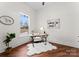 Cozy home office with a desk, large window, and hardwood floors at 108 Augusta Ln, Shelby, NC 28150