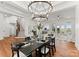 Elegant dining room featuring a large chandelier and a spacious table for six at 108 Augusta Ln, Shelby, NC 28150