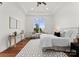 Bright bedroom with hardwood floors, large window, and ample natural light at 108 Augusta Ln, Shelby, NC 28150