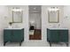 Elegant bathroom with double vanity, green cabinets, and gold accents at 108 Augusta Ln, Shelby, NC 28150