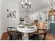 Bright dining area with a round table and four black chairs at 108 Augusta Ln, Shelby, NC 28150