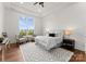 Bright bedroom with hardwood floors, large window, and ample natural light at 108 Augusta Ln, Shelby, NC 28150
