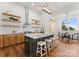 Modern kitchen with light wood cabinets and a large island with seating at 108 Augusta Ln, Shelby, NC 28150