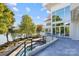 Elevated patio overlooks the pool and serene lake views at 102 Eastham Ct, Mooresville, NC 28117