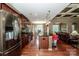 Open concept kitchen with stainless steel appliances and views into the living room at 1136 Brookdale Ln, Stanley, NC 28164