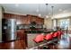 Spacious kitchen with breakfast nook, an island, and stainless steel appliances at 1136 Brookdale Ln, Stanley, NC 28164