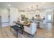 Elegant dining area adjacent to the kitchen with a modern dining table at 2033 Bayou Trace Dr # Lot 7, Charlotte, NC 28262