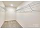 Spacious walk-in closet with wire shelving at 2033 Bayou Trace Dr # Lot 7, Charlotte, NC 28262