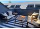 Relaxing rooftop deck with stylish seating and city views at 221 Sutton Park Ln # 10, Charlotte, NC 28211