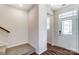 Bright entryway with hardwood floors and staircase at 14917 Tamarack Dr, Charlotte, NC 28278