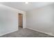 Bedroom with grey carpet and a spacious closet at 14917 Tamarack Dr, Charlotte, NC 28278