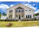 Two-story house with stone accents and a landscaped lawn at 14917 Tamarack Dr, Charlotte, NC 28278