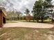 Spacious driveway with large yard and trees at 4909 Pleasant Grove Rd, Waxhaw, NC 28173