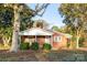 Brick ranch home with covered porch and mature landscaping at 24947 Nc 24/27 Hwy, Albemarle, NC 28001
